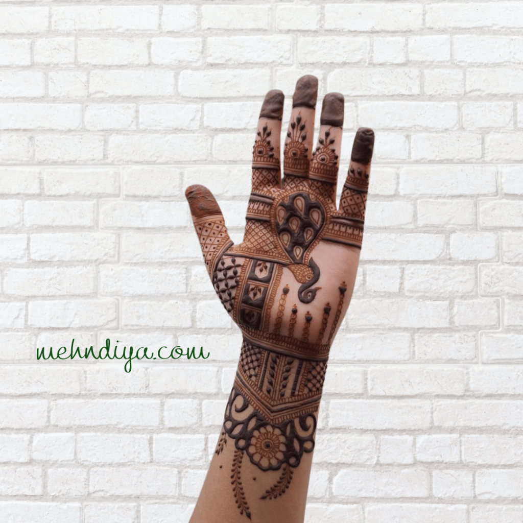 beautiful peacock with fancy henna pattern