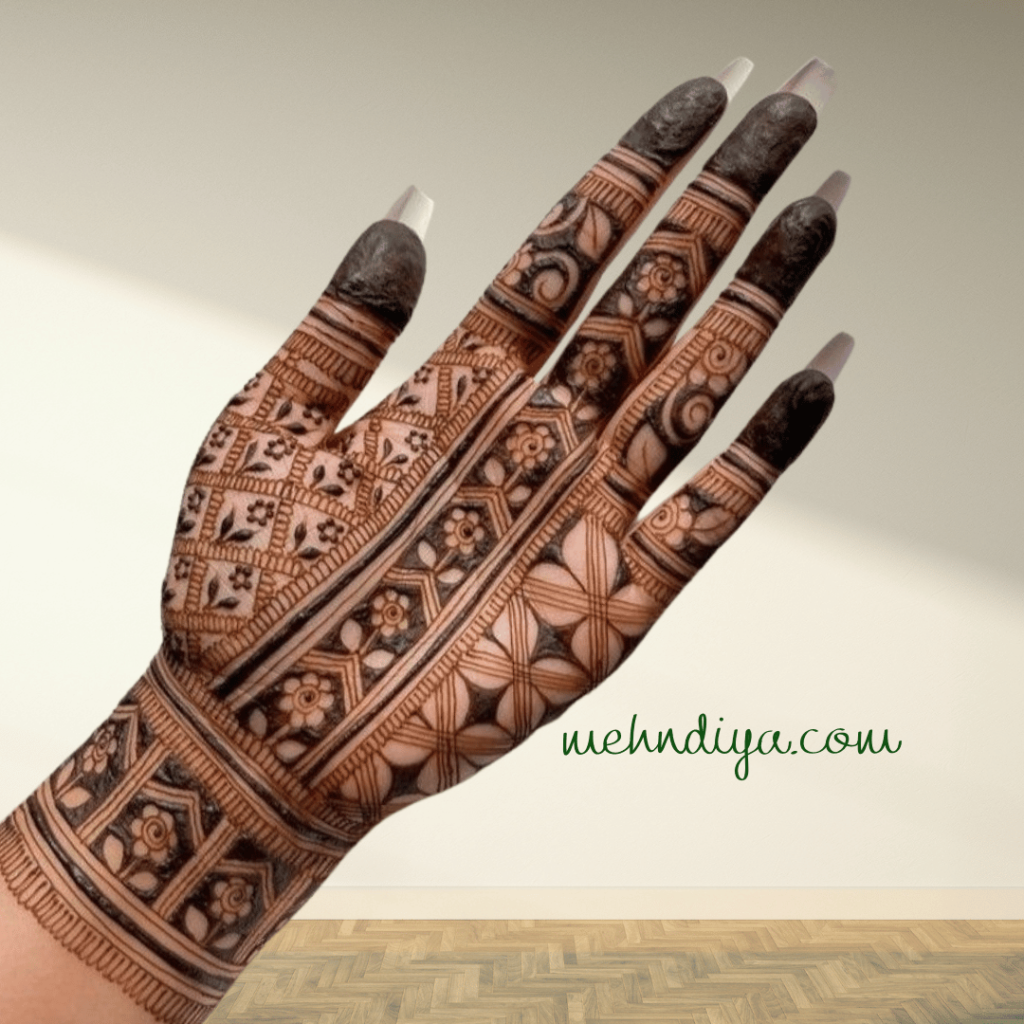 bride having arabic mehndi design full hand covered with beautiful lines and shapes