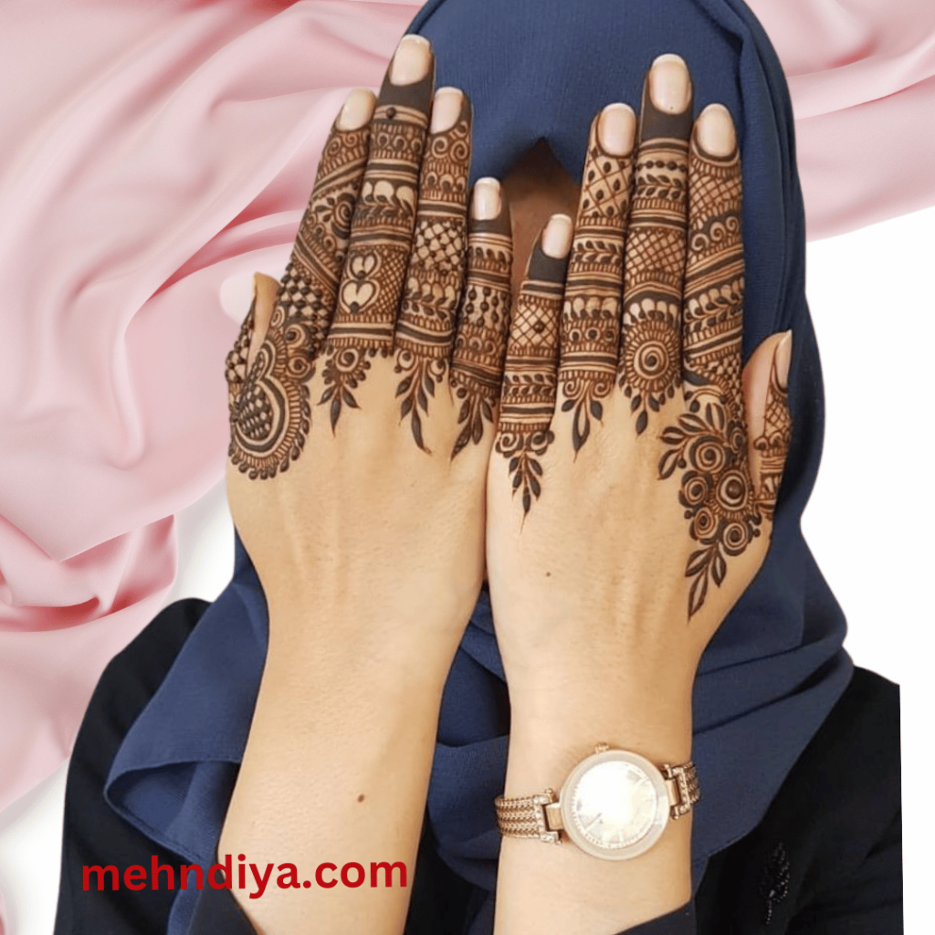 A girl having hands fingers covered with modern patterns of henna design
