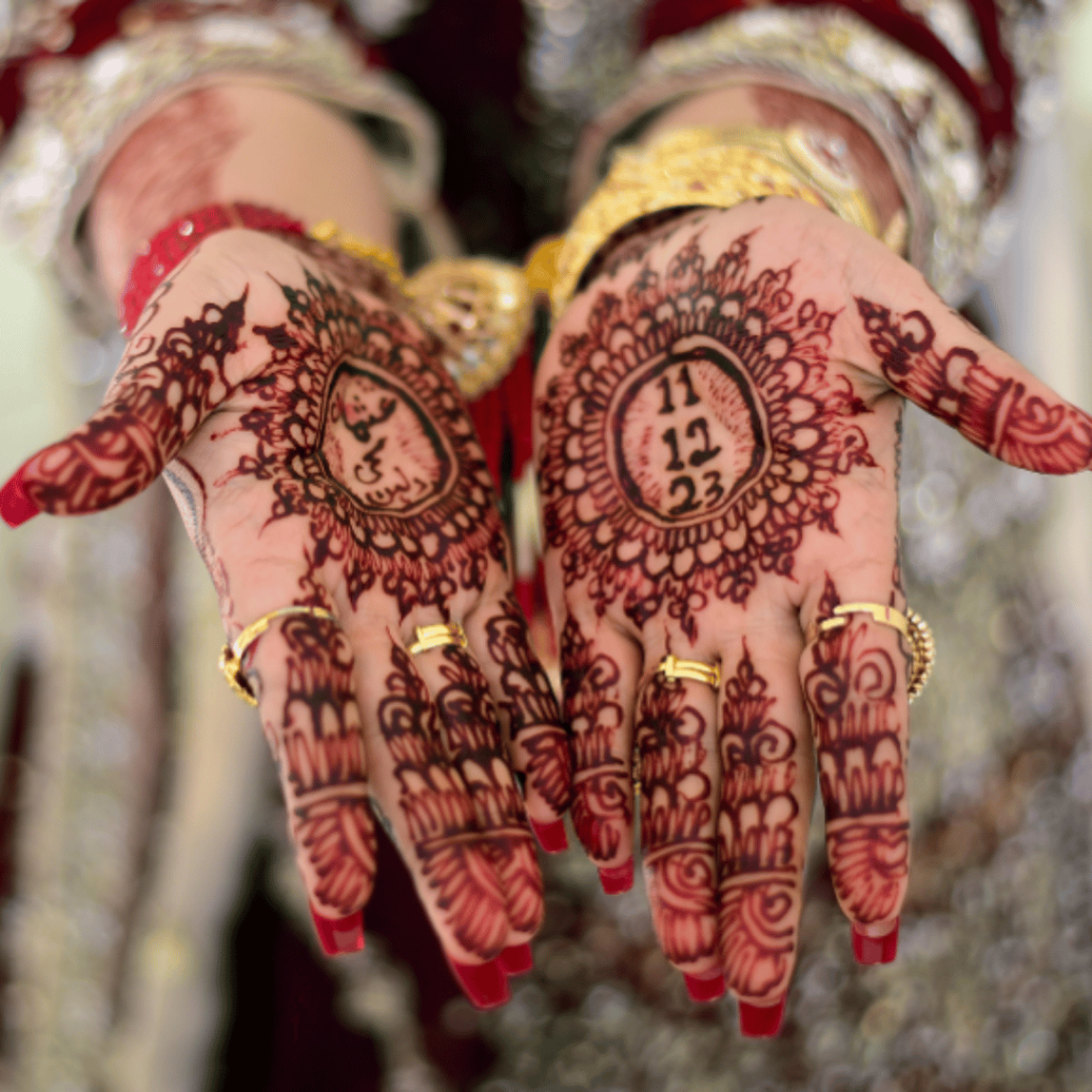 groom name hidden in henna bride hand