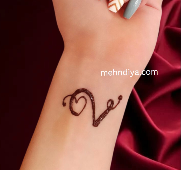100 Simple Name Mehndi Designs: bridal and Alphabetic names for 2025 24 Wrist tattoo mehndi design V